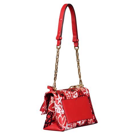 michael kors red graffiti bag|Michael Kors purses today.